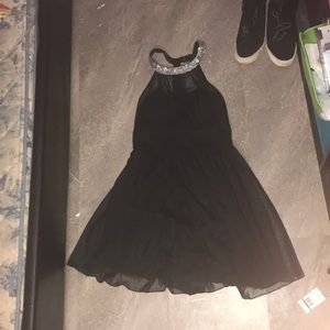 Black speechless neck strap dress